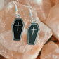 Occult black and silver earrings