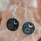 Occult black and silver earrings