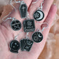 Occult black and silver earrings