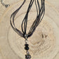 Bird Skull Necklace with lava stones