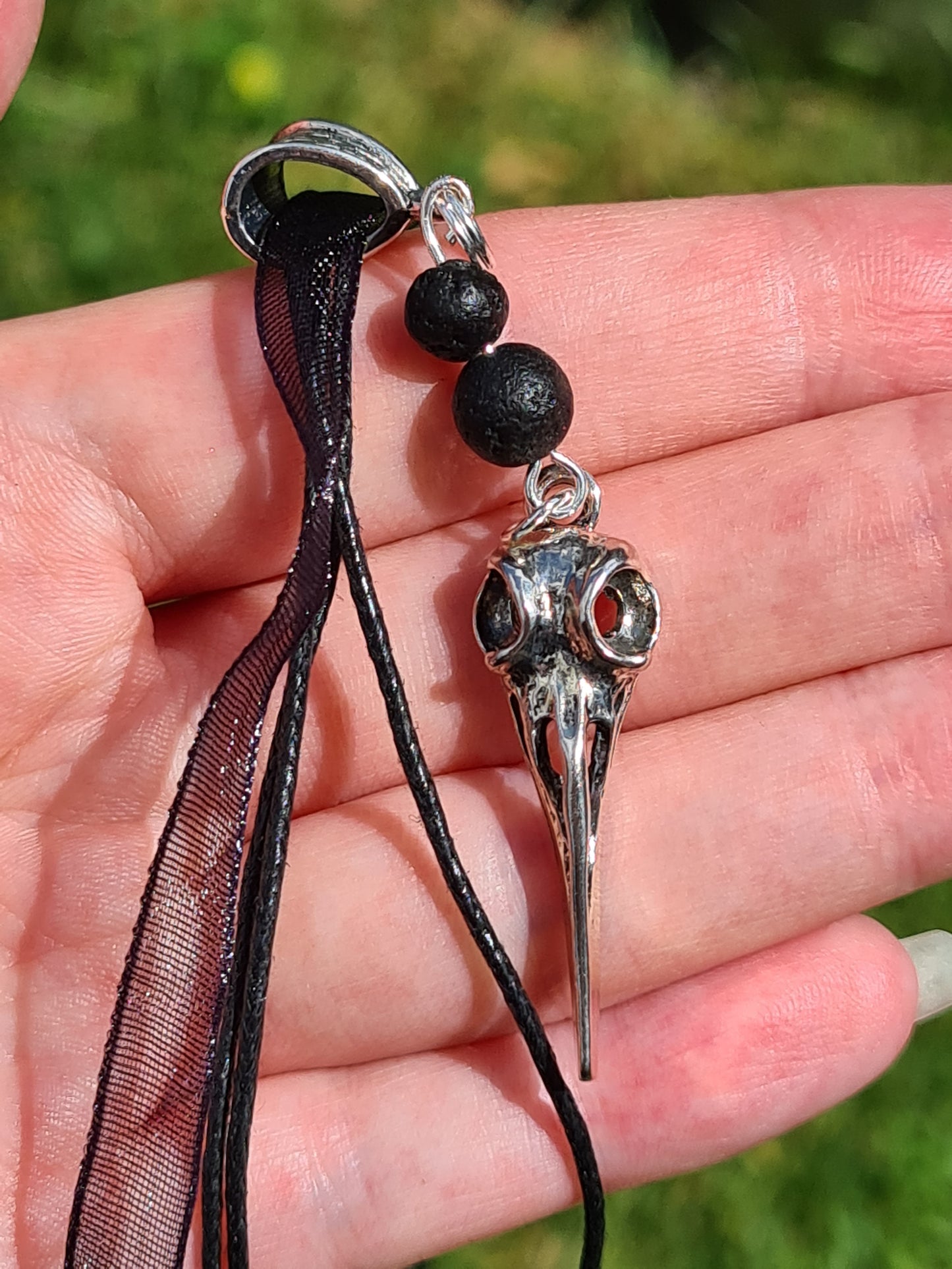 Bird Skull Necklace with lava stones