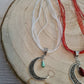 Filigree Moon pendant with drop bead on a organza ribbon choker