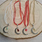 Filigree Moon pendant with drop bead on a organza ribbon choker