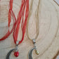 Filigree Moon pendant with drop bead on a organza ribbon choker