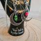 Crescent moon pendant with heart drop