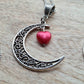Crescent moon pendant with heart drop
