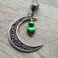 Crescent moon pendant with heart drop