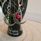 Crescent moon pendant with heart drop